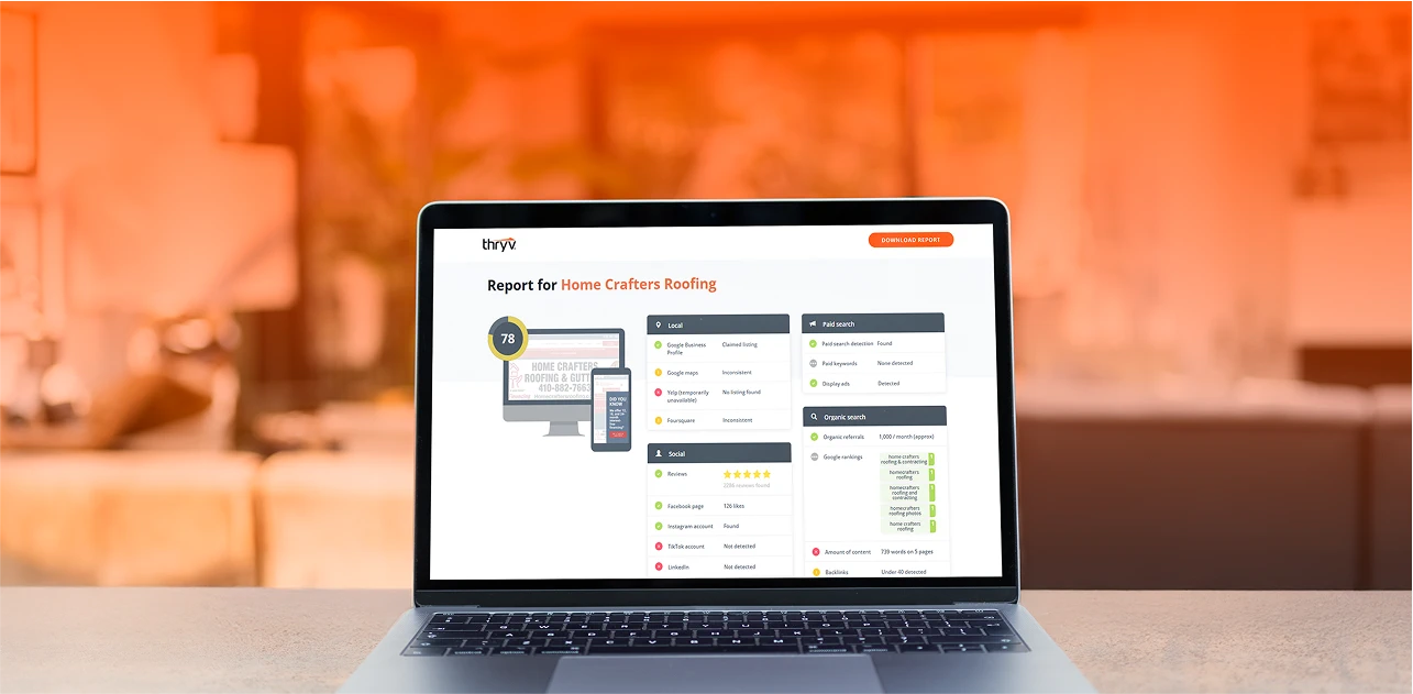 A laptop with the screen showing Thryv's business report tool